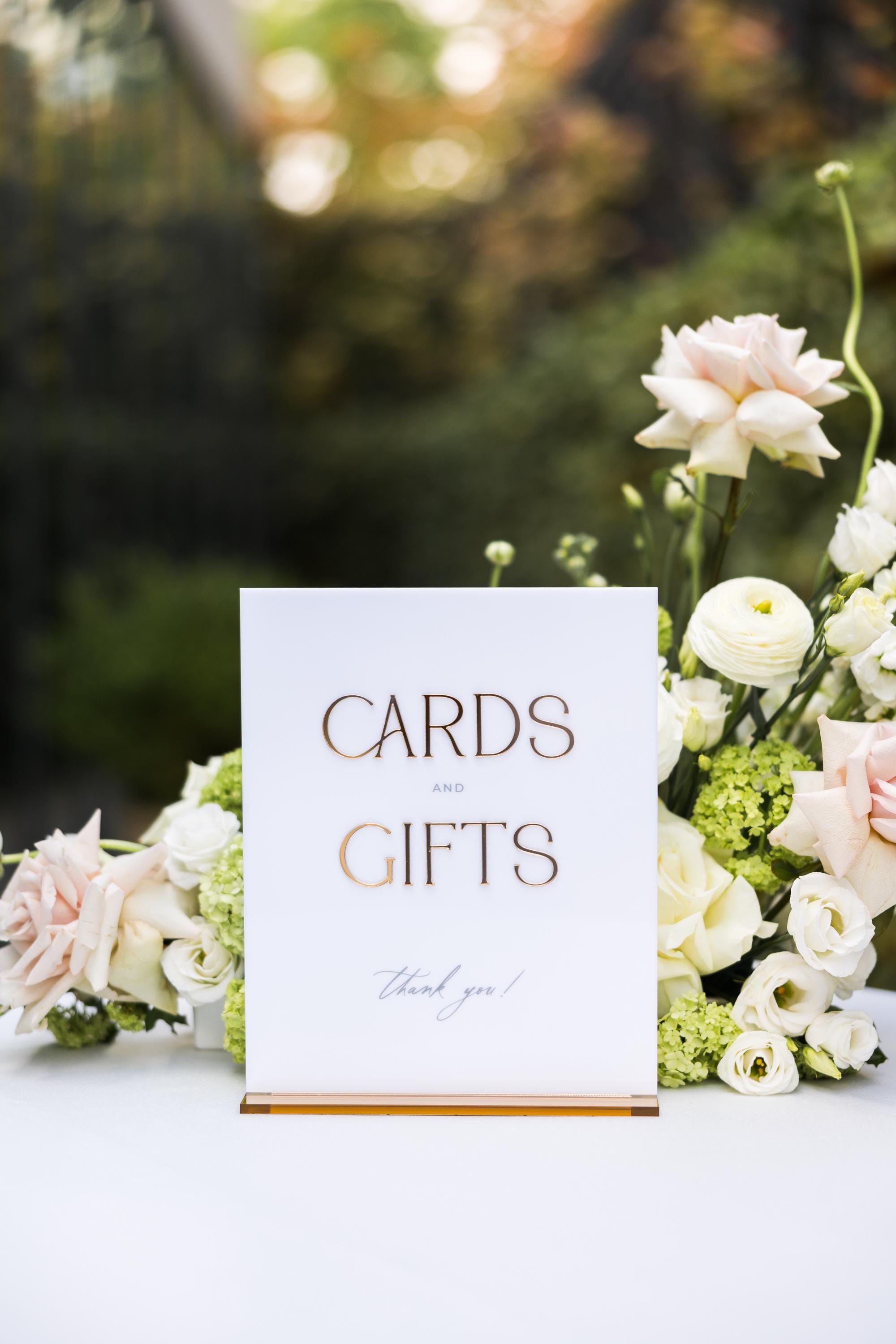 Cards and Gifts wedding sign white acrylic with gold mirror text on stand

