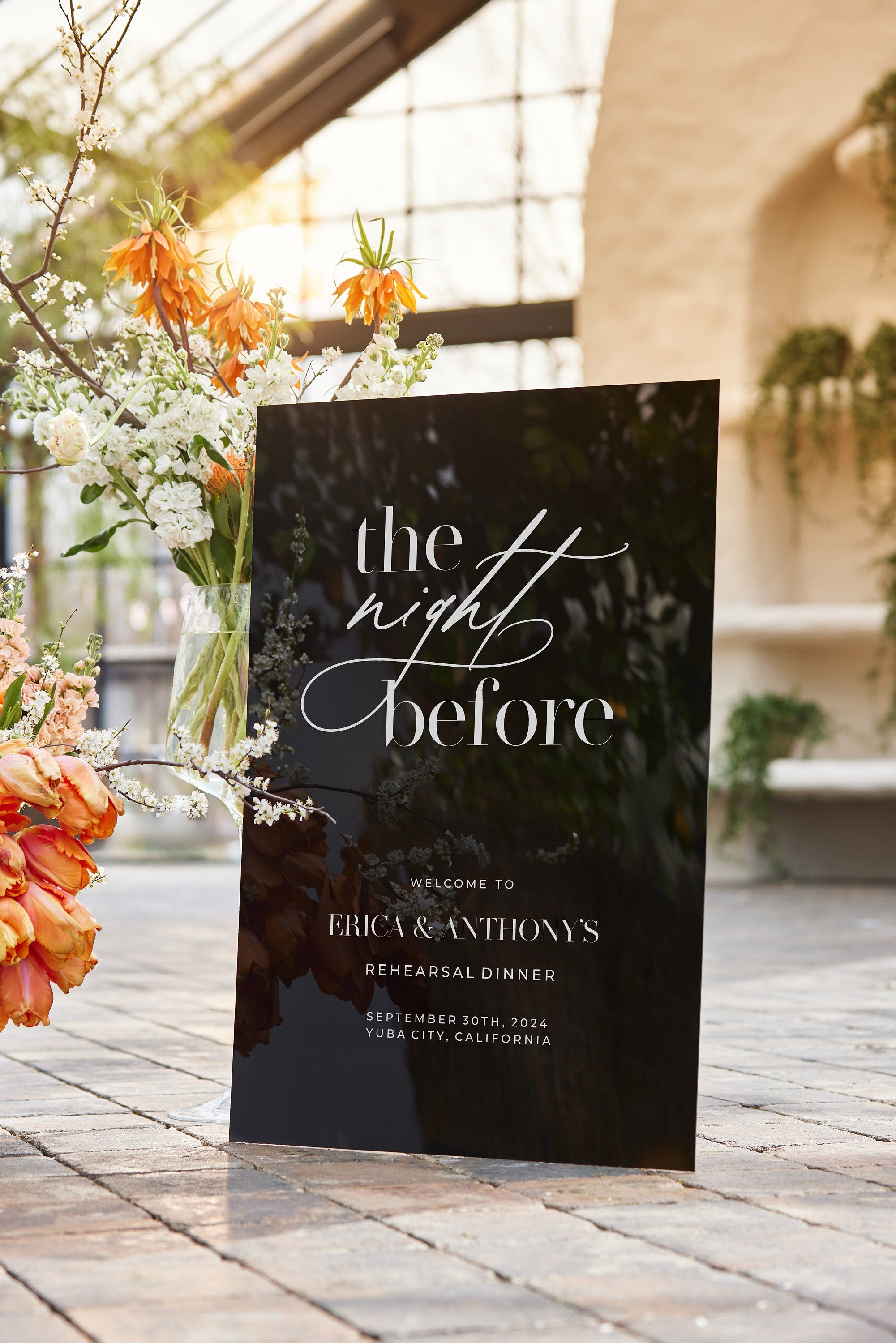 Black acrylic wedding rehearsal dinner sign with The Night Before custom text
