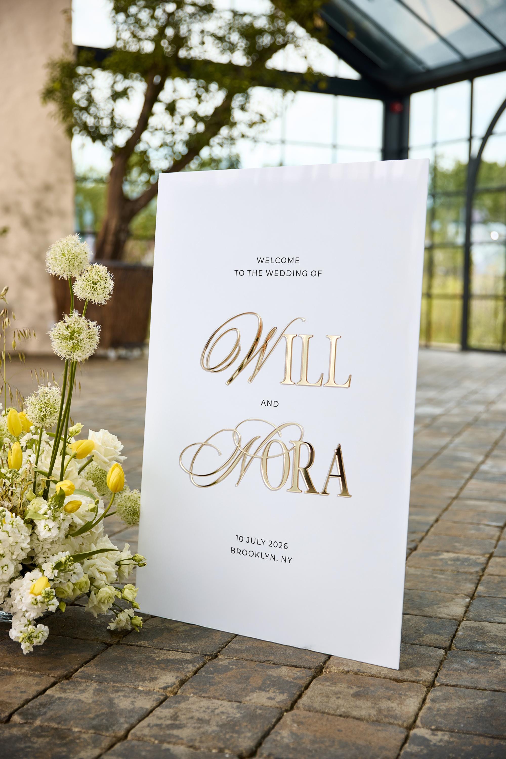 Wedding welcome sign in white acrylic with 3D gold mirror names and personalized date and reception venue
