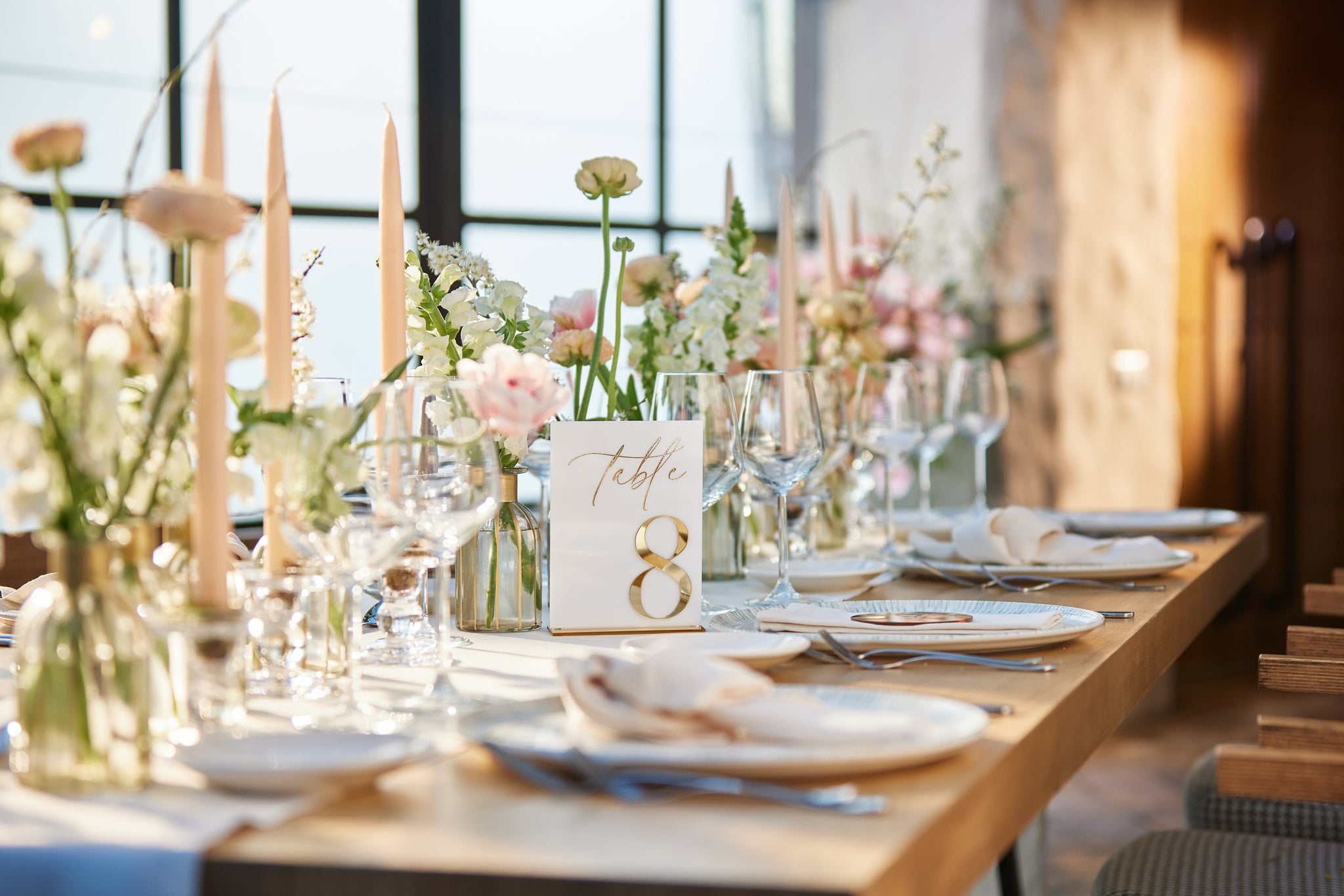 Wedding table numbers white acrylic 3D gold mirror displayed on reception table

