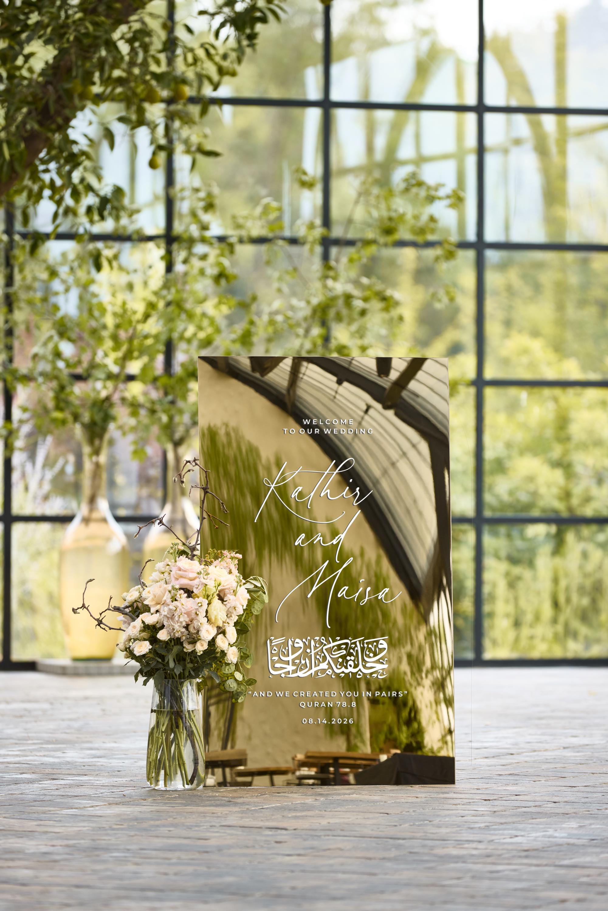 Nikkah ceremony sign featuring gold mirror Arabic calligraphy decor
