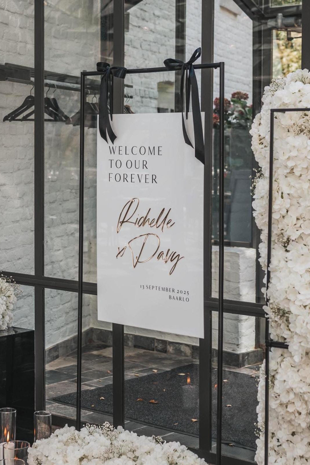 White acrylic wedding welcome sign with 3D gold mirror names 
