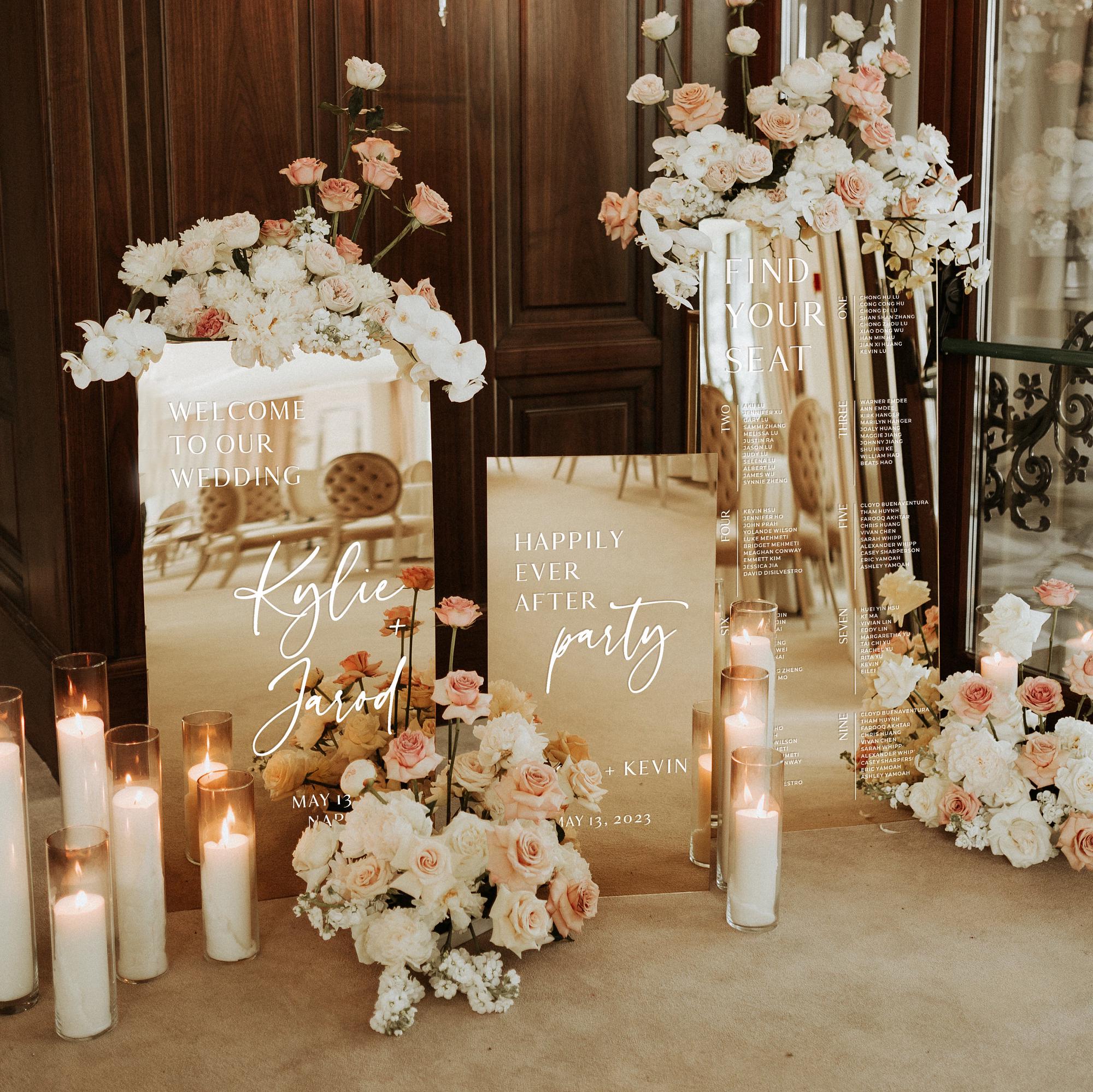 Gold mirror wedding welcome sign with Happily Ever After Party, and seating plan