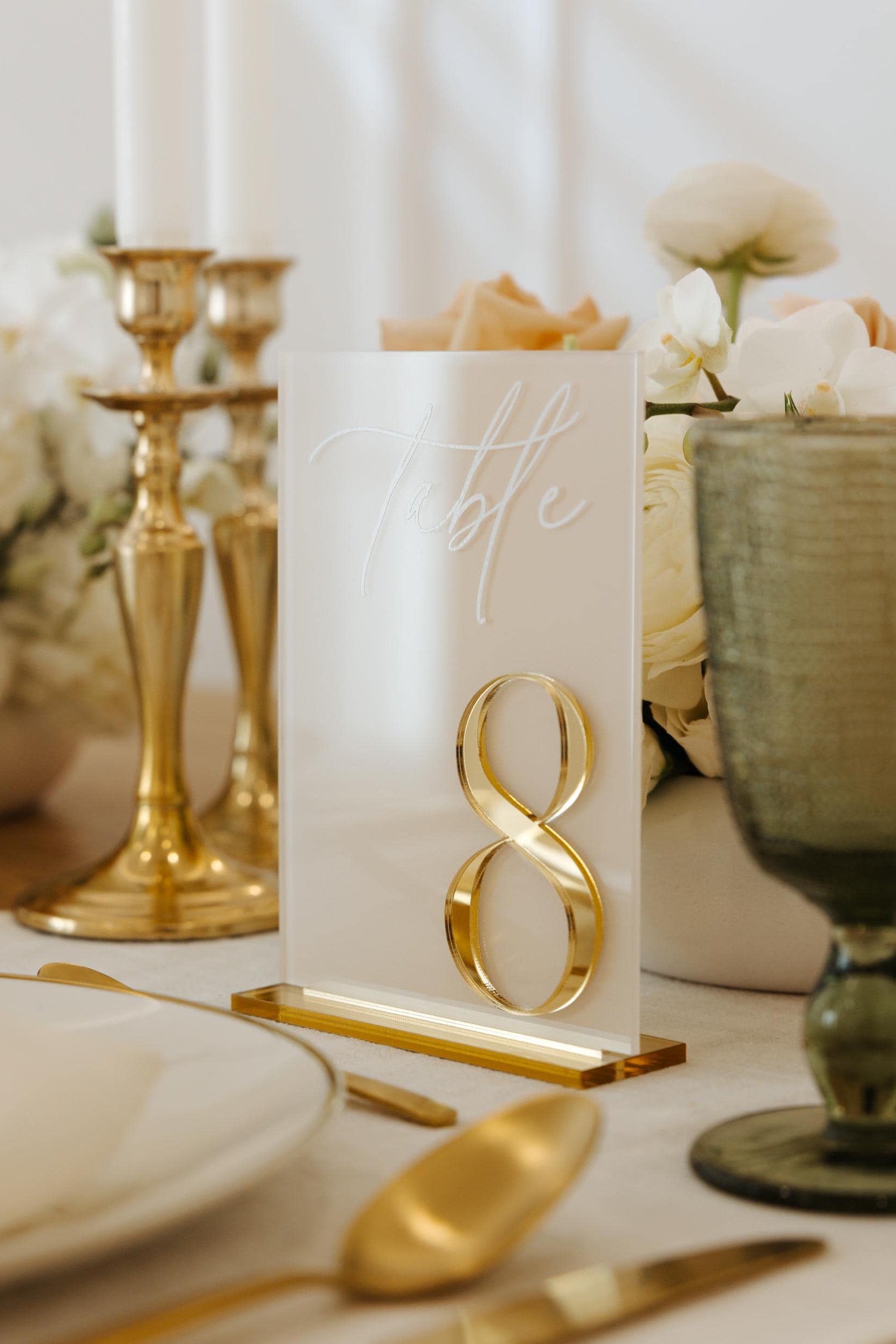 Beige acrylic wedding table number with gold mirror stand