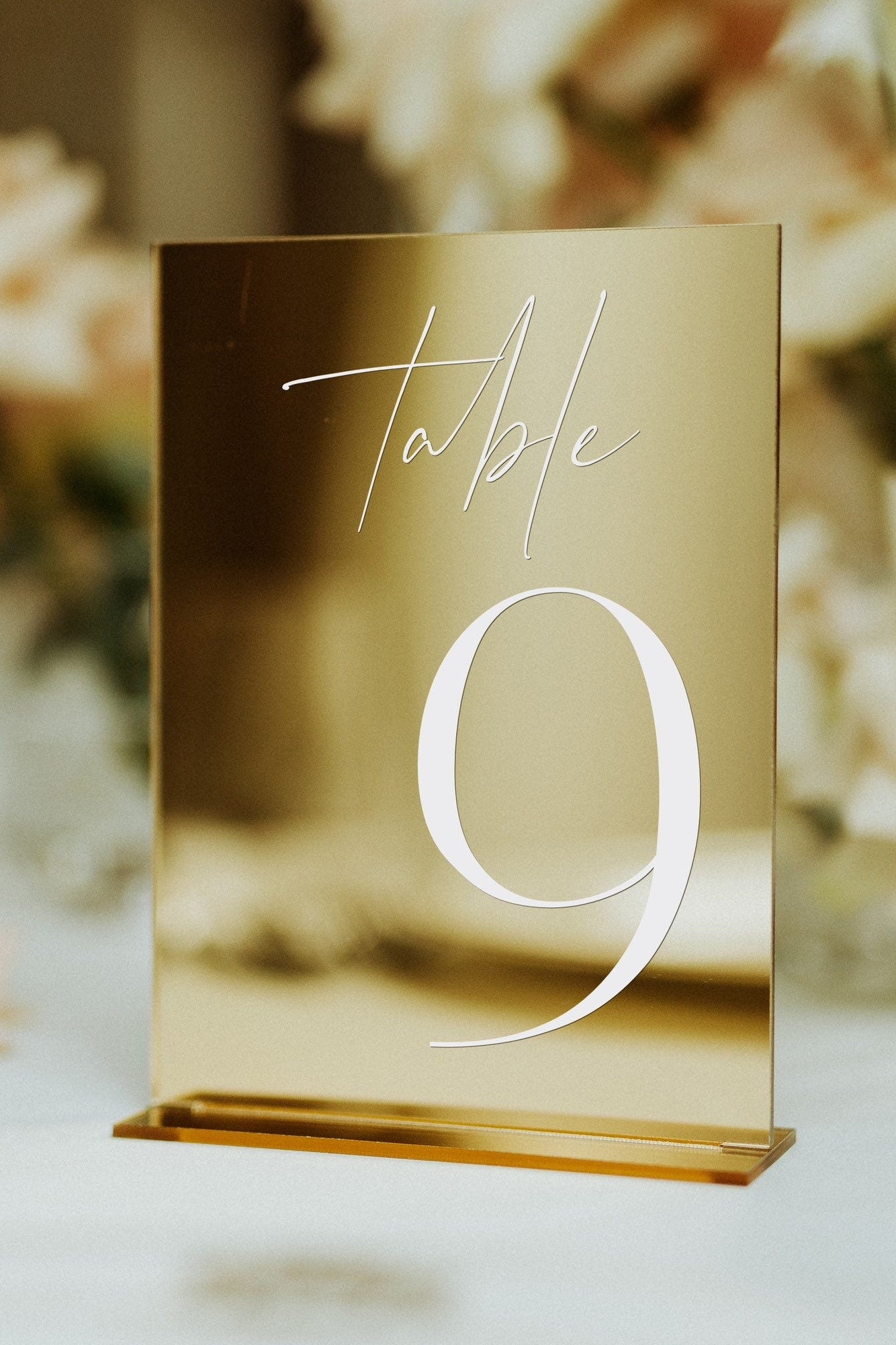 Gold mirror acrylic wedding table number with matching stand