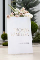 White acrylic wedding welcome sign with 3D gold mirror names and personalized text
