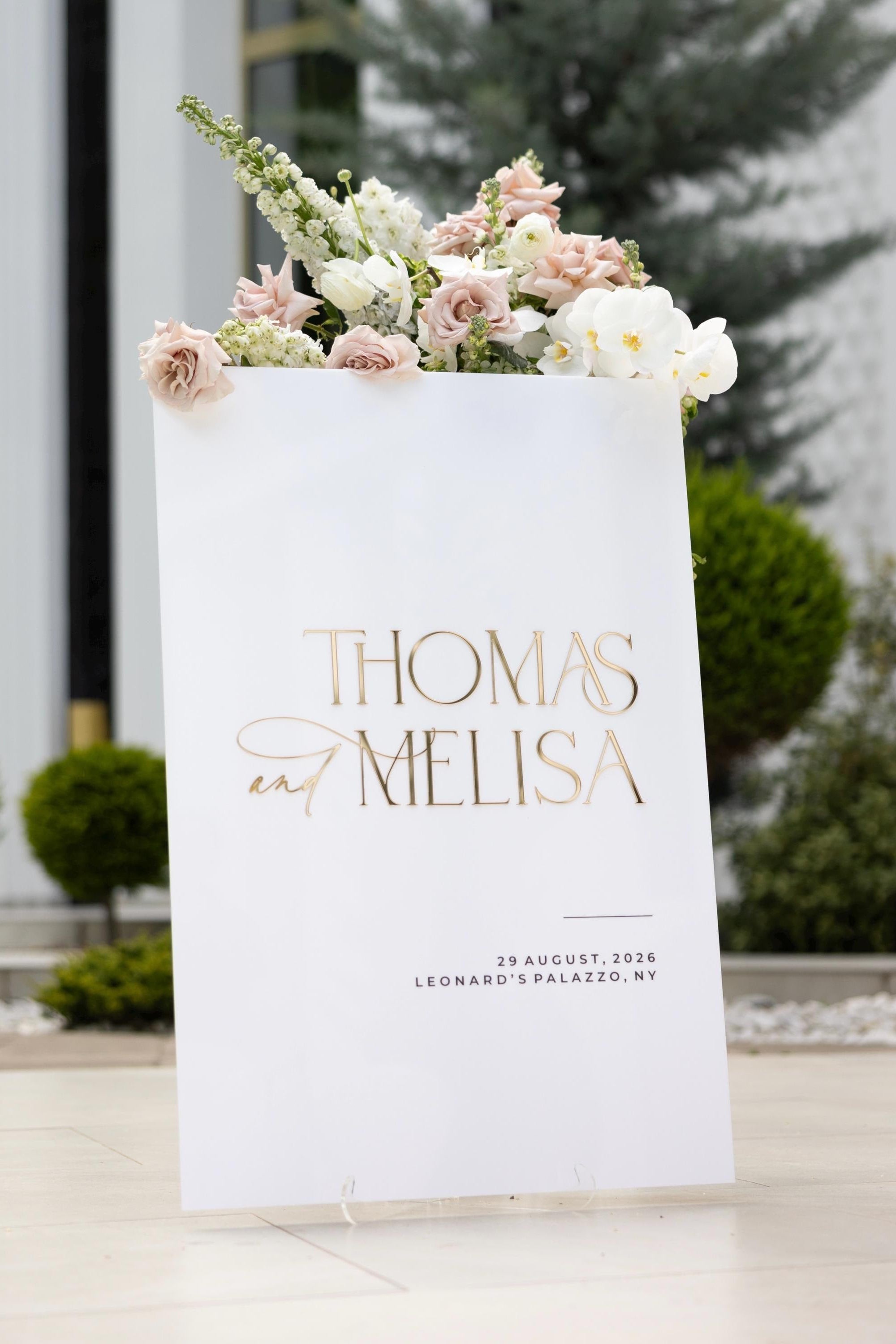 White acrylic wedding welcome sign with 3D gold mirror names and personalized text
