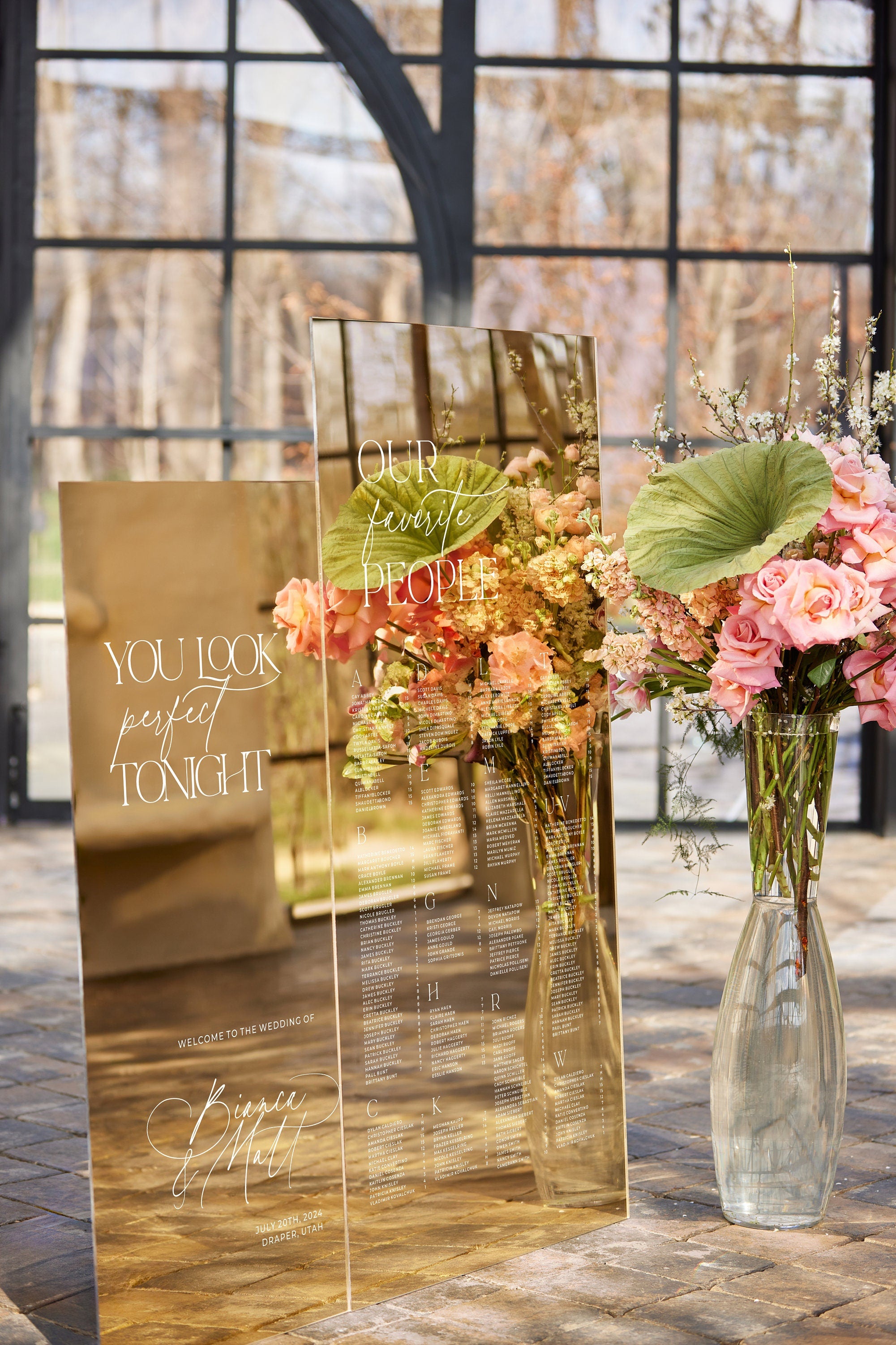 Gold mirror wedding signs bundle seating plan and welcome sign displayed at wedding reception
