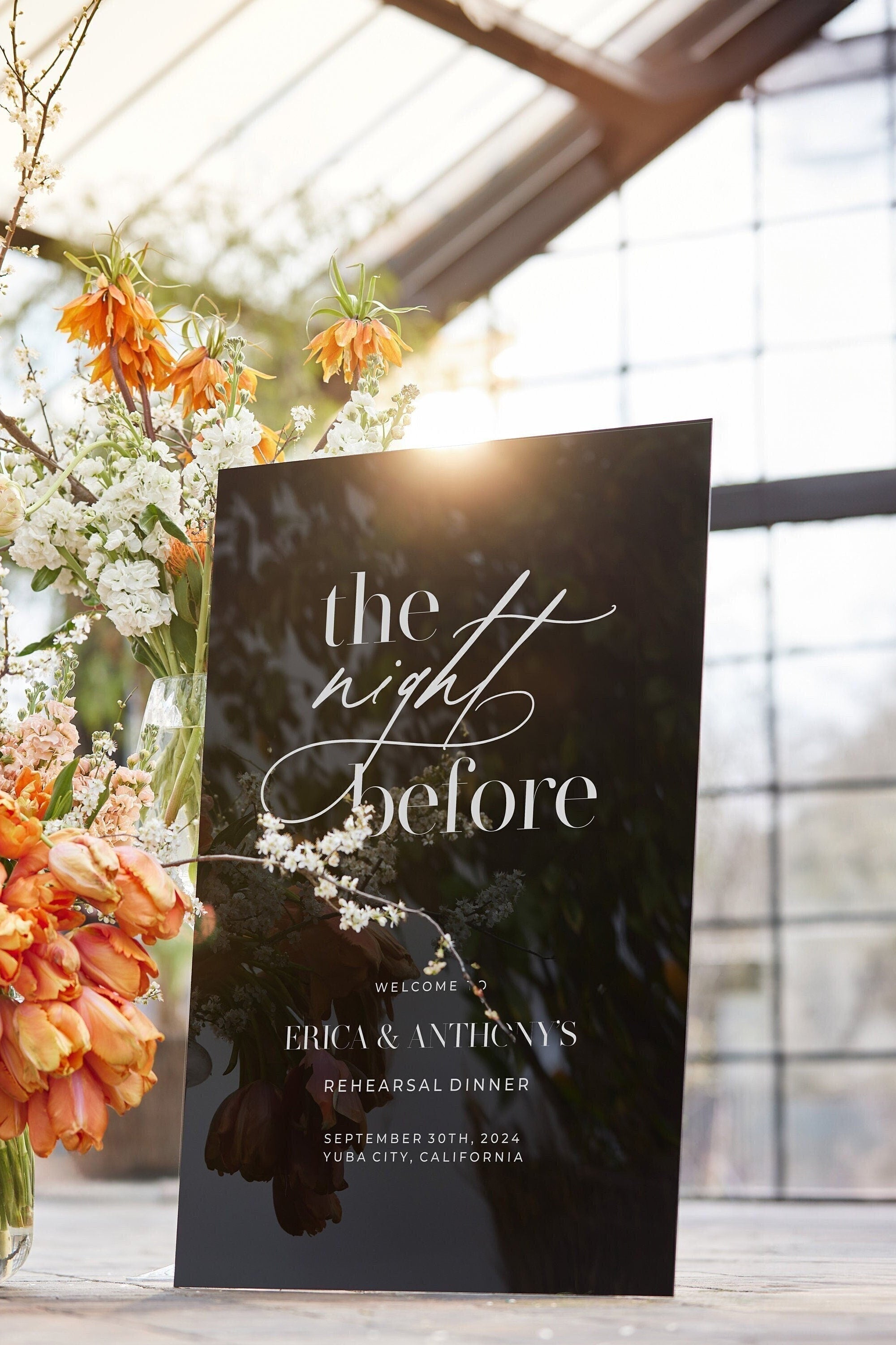 Rehearsal dinner welcome sign The Night Before black acrylic with white lettering
