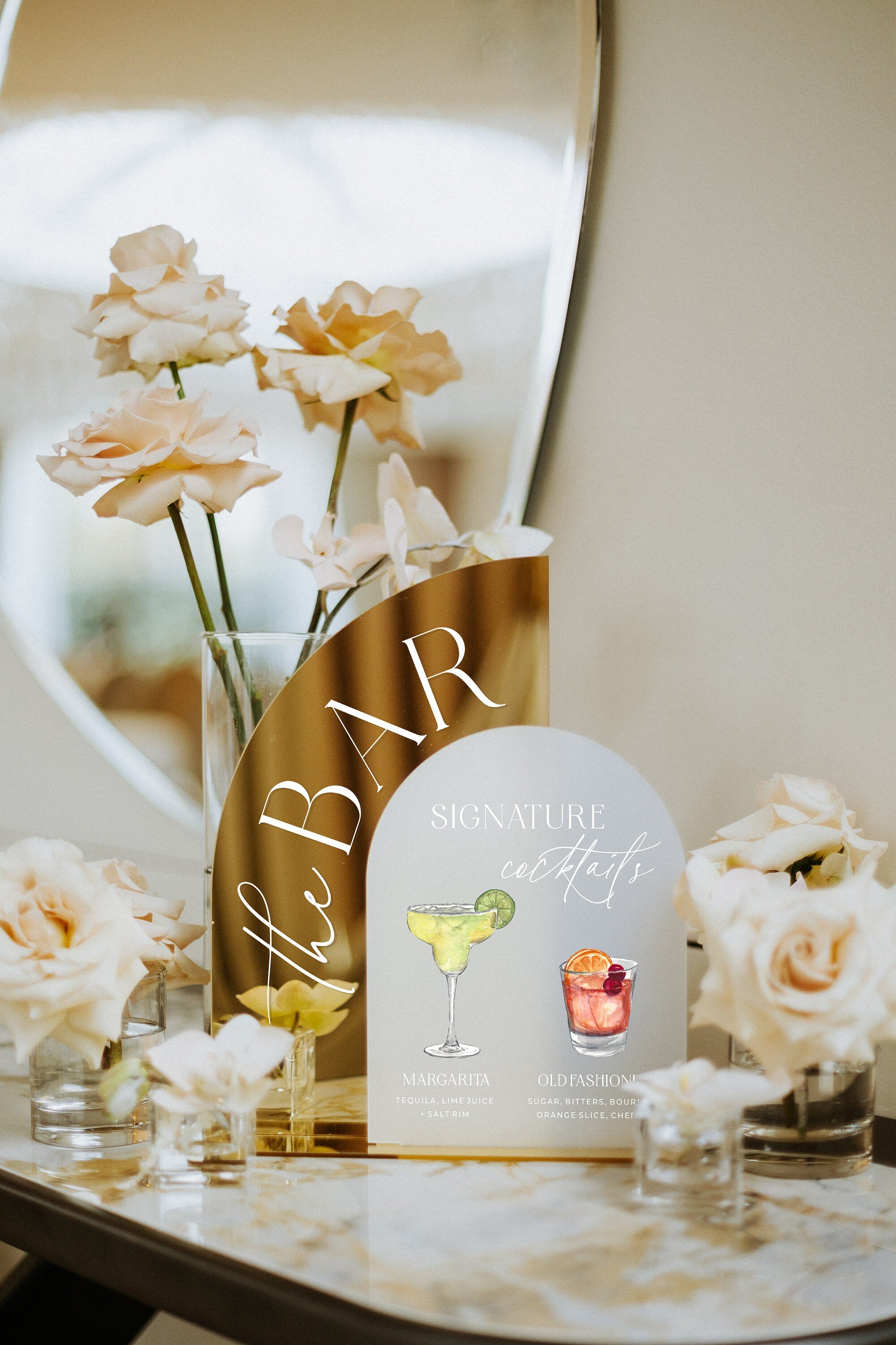 His and hers signature cocktails on gold mirror and frosted acrylic signs

