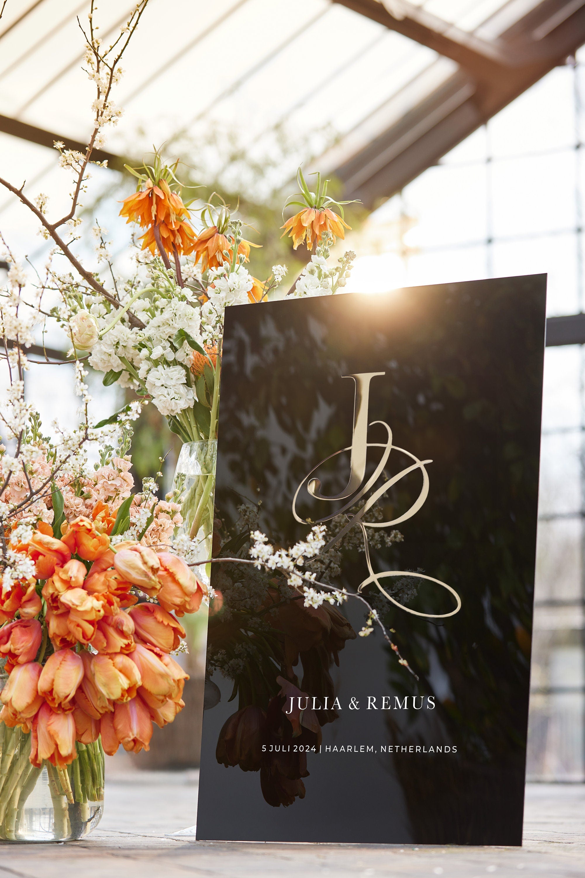 Personalized acrylic wedding sign with elegant gold script monogram