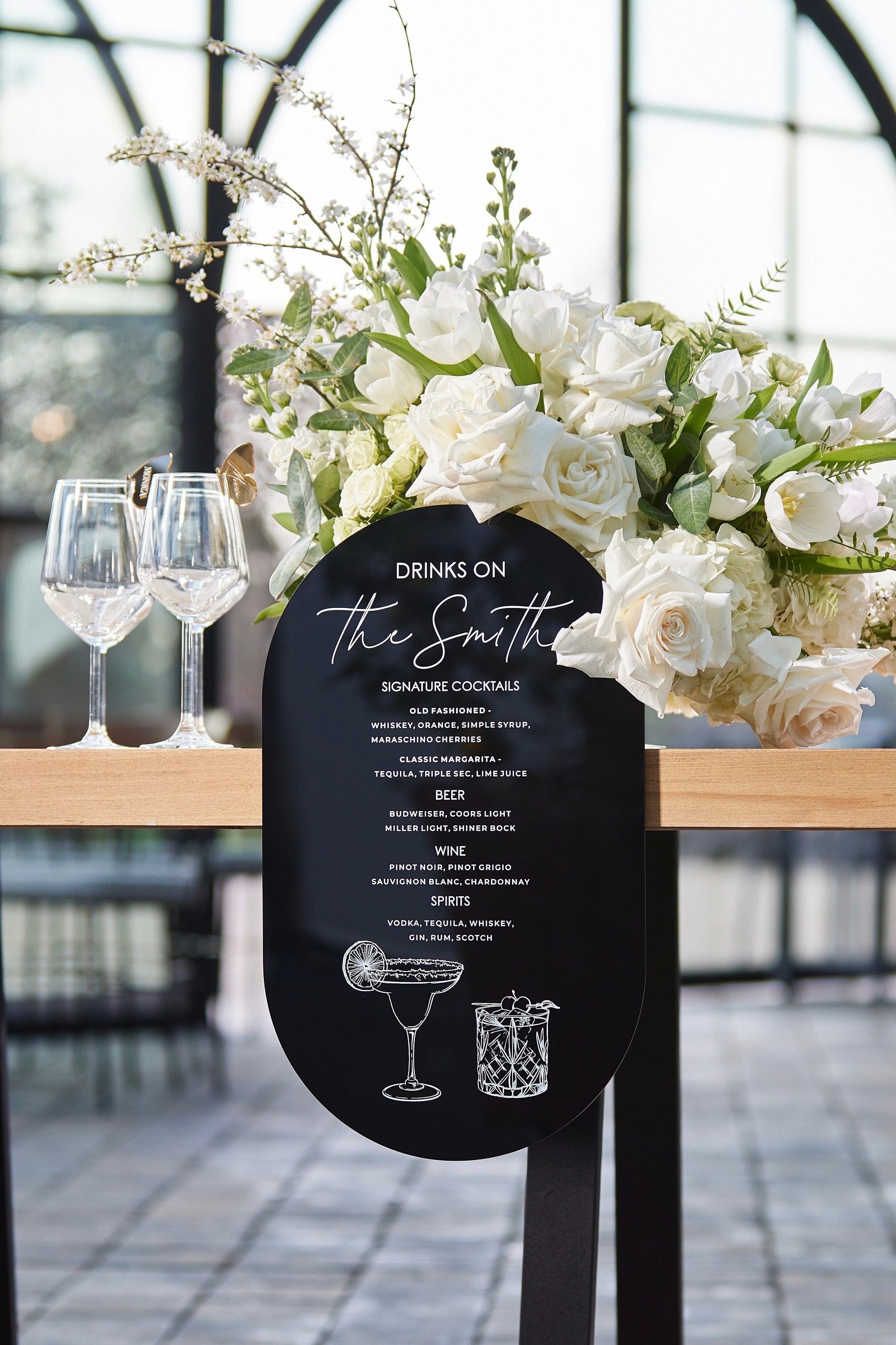 Black acrylic wedding bar sign with signature drinks menu and cocktail list