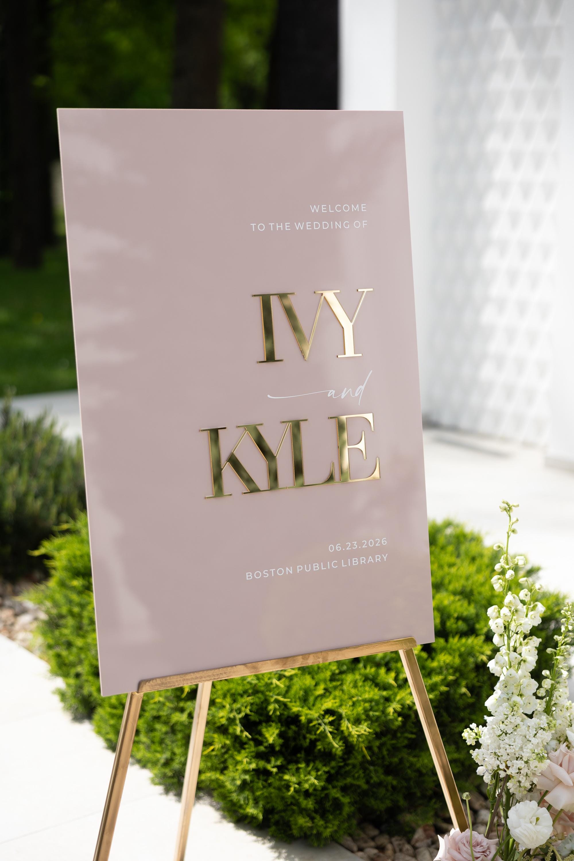 Dusty Pink Wedding Welcome Sign featuring oversized 3D gold mirror names