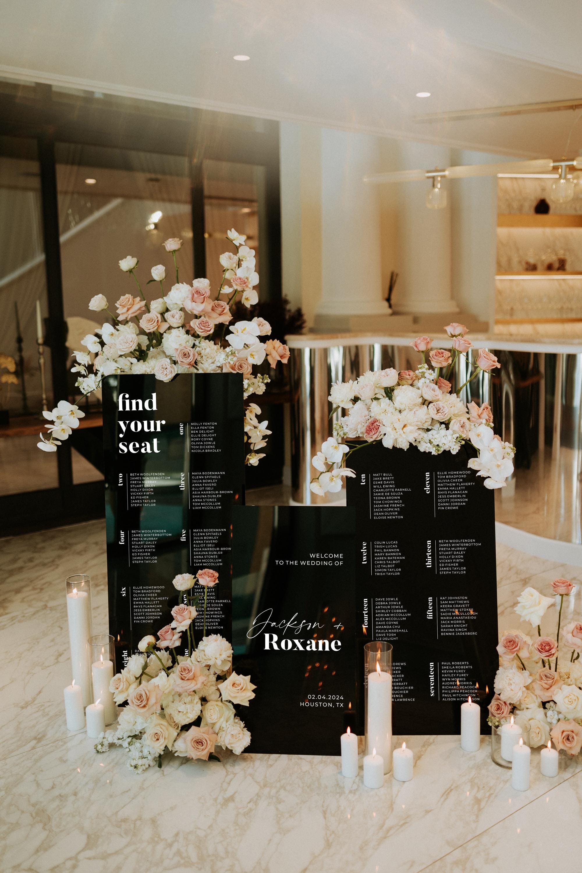 Black acrylic wedding welcome sign with personalized names and date