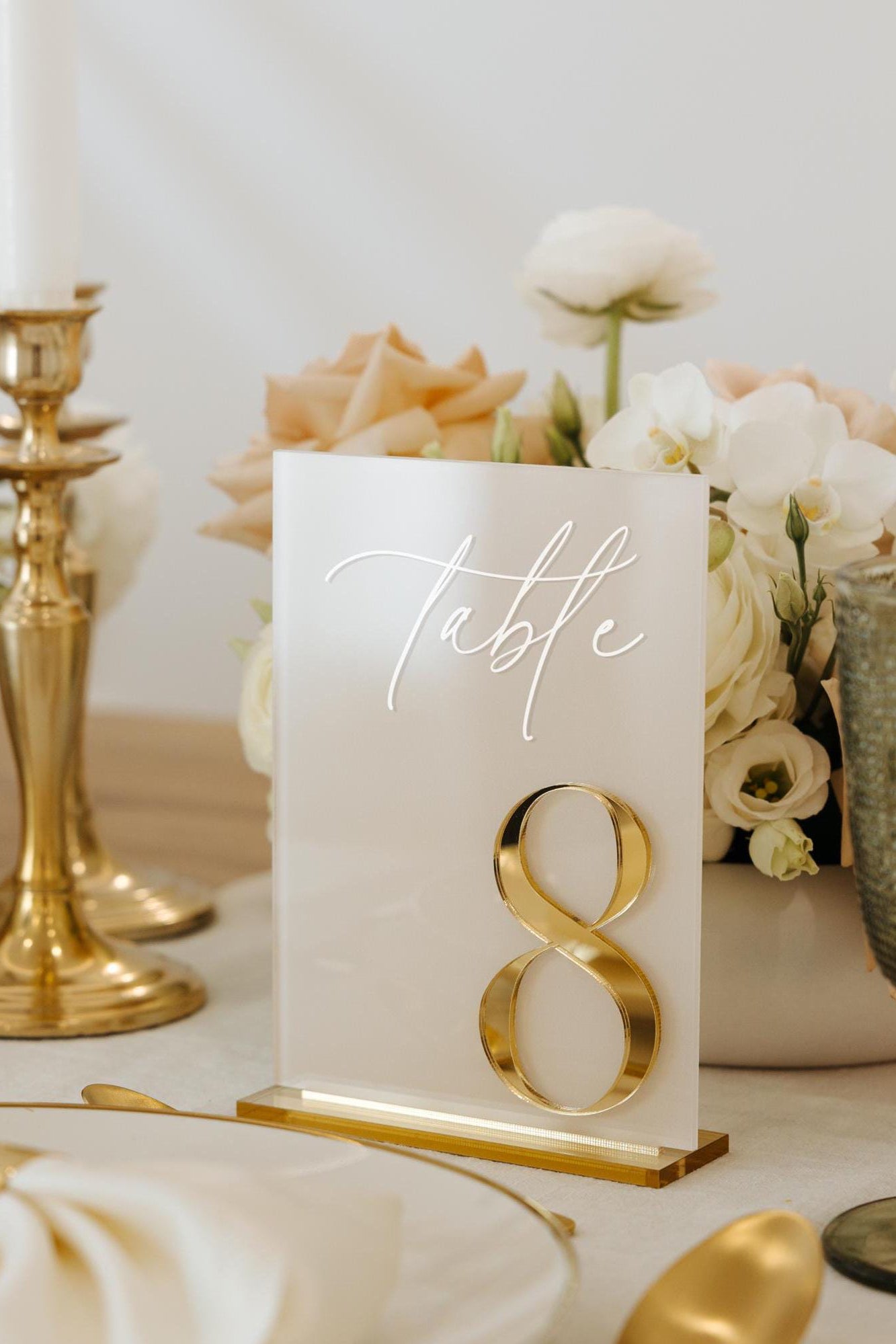 Table number sign with beige acrylic background and 3D gold number
