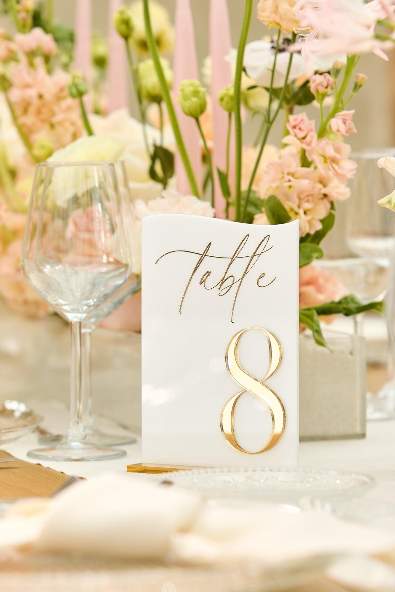 Wedding table number white acrylic with 3D gold mirror detail on reception table
