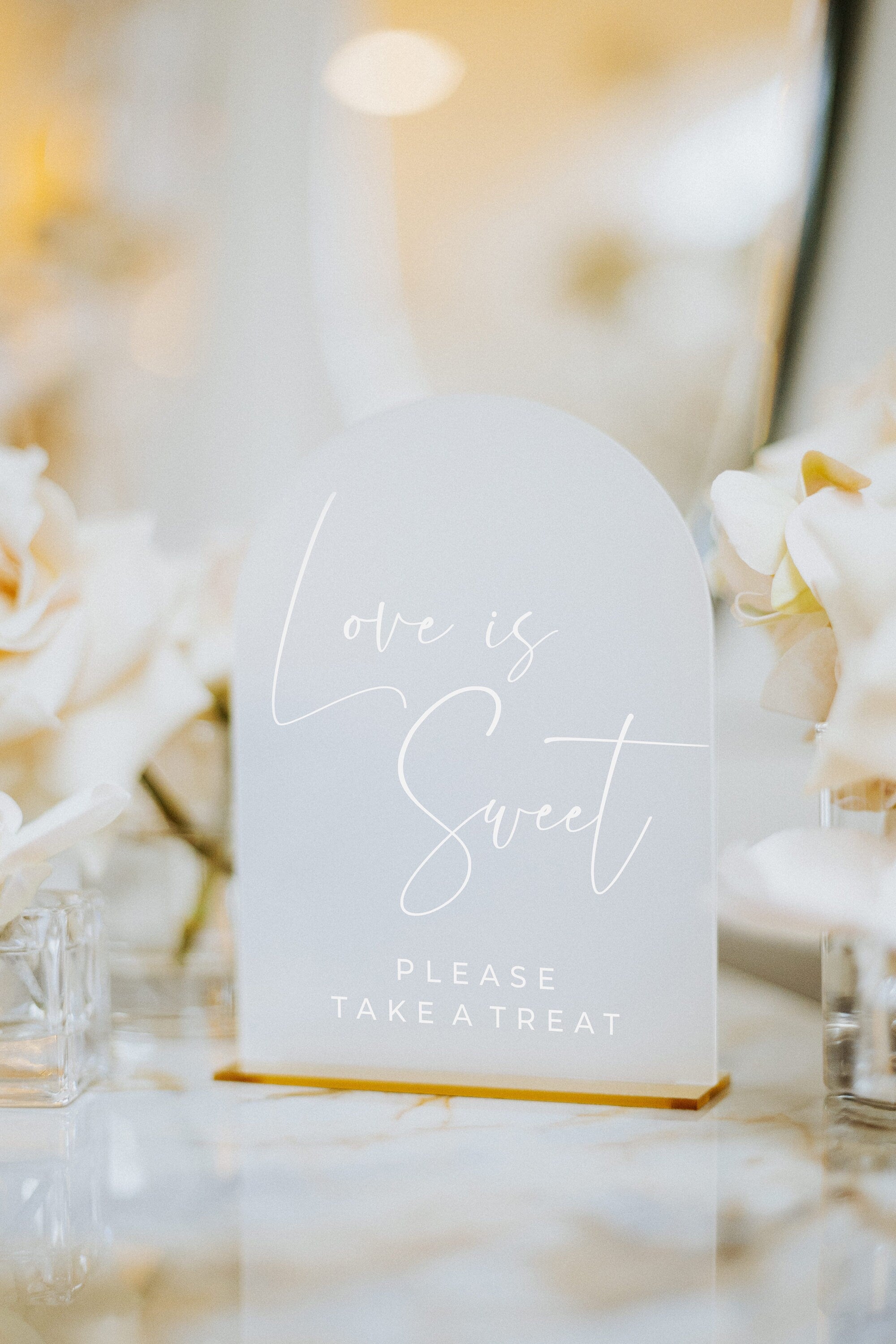 Love is sweet dessert table sign in frosted acrylic and gold mirror stand