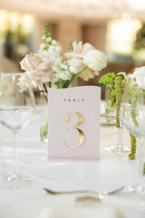  Mauve pink acrylic table number with gold font.