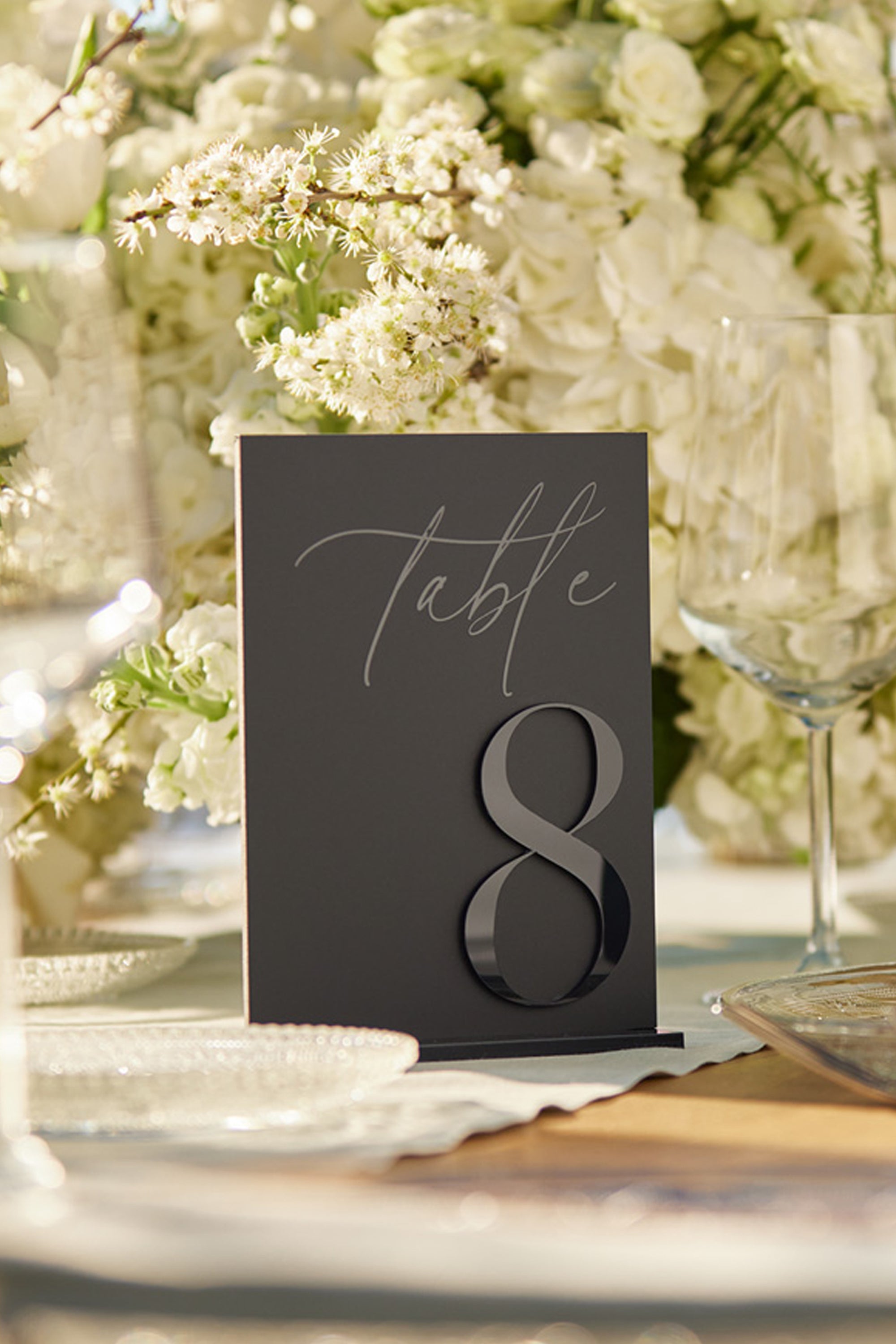 Luxury matte black reception decor for contemporary weddings.