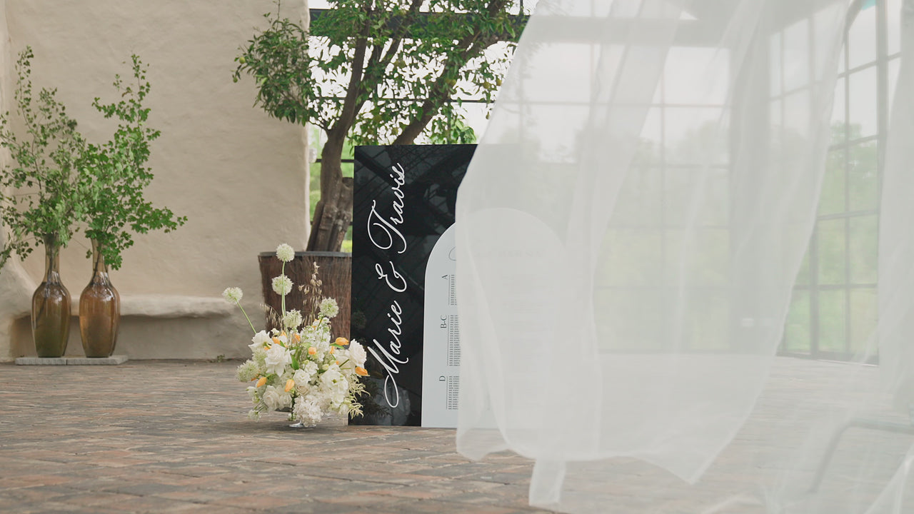 Black and White Acrylic Wedding Seating Chart by MoniquePaperArt featuring 3D raised lettering and modern luxury design