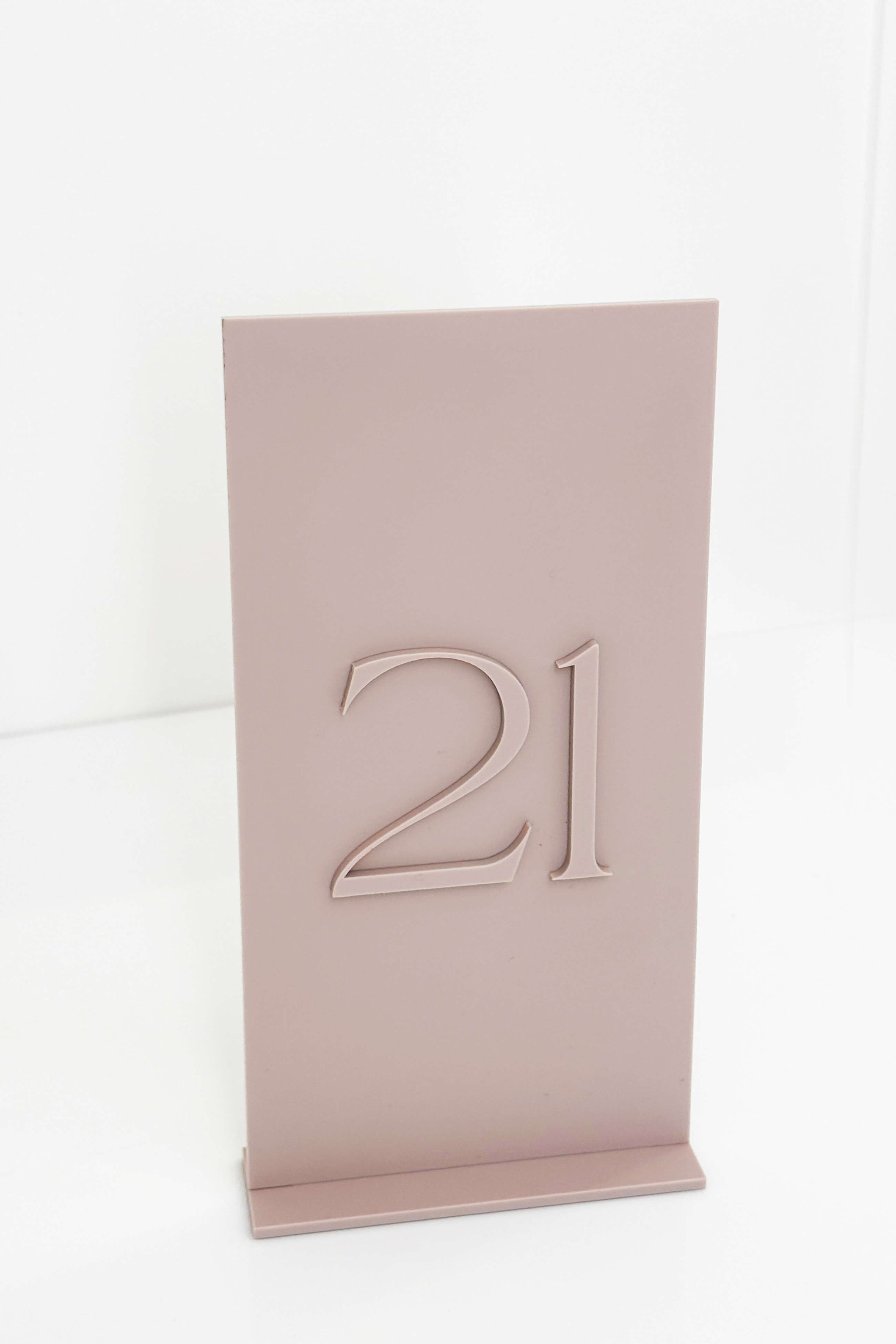 Luxury wedding table number featuring 3D dusty pink numerals.