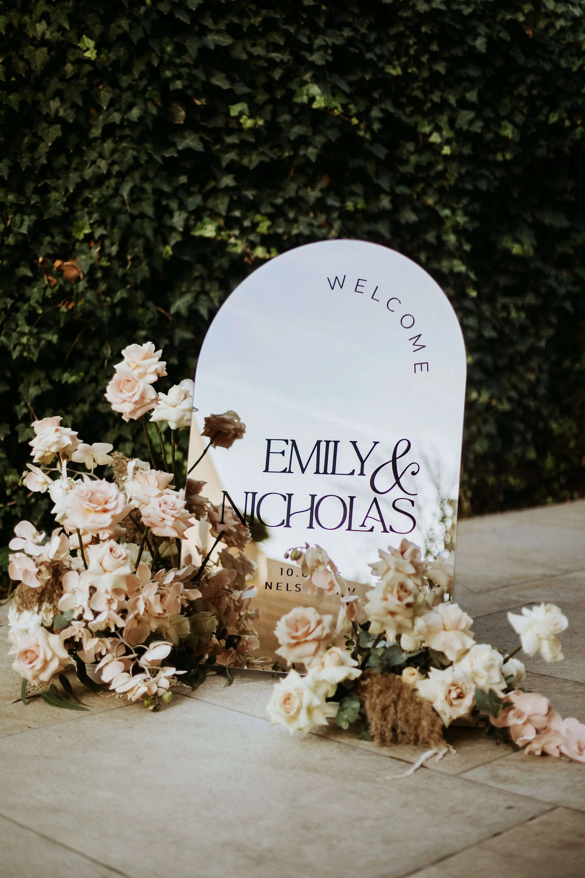 Silver mirror acrylic wedding welcome sign in arched shape designed for reception entrance